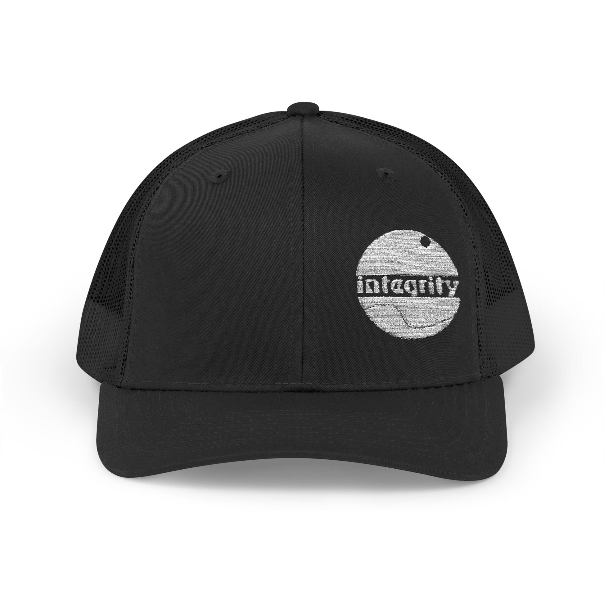 A front view of the snap back trucker hat in all black. Showing the embroidered integrity design and the breathable mesh material. 